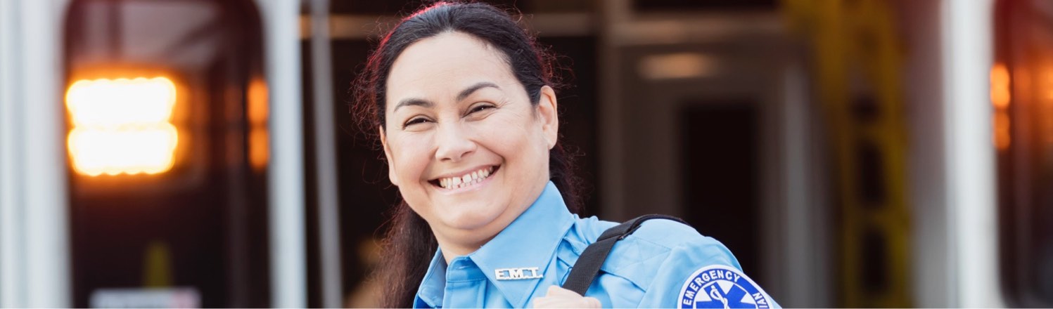 Paramedic In front of an ambulance 