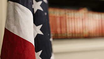 Flag in front of books